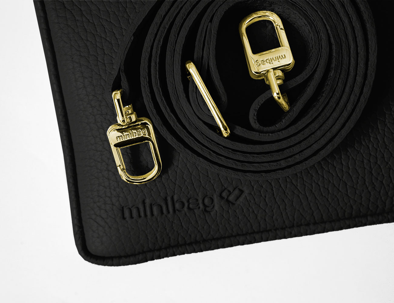 minibag black Edition GOLD, schwarze Ledertasche, goldene Riemen, Prägung minibag Logo, minibag, kleine schwarze Tasche zum Umhängen, Handytasche zum Umhängen, Handytasche mit Geldbörse